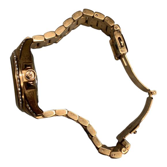 Michael Kors Blair Gold Tone Rhinestone Bezel Analog Wristwatch needs battery
